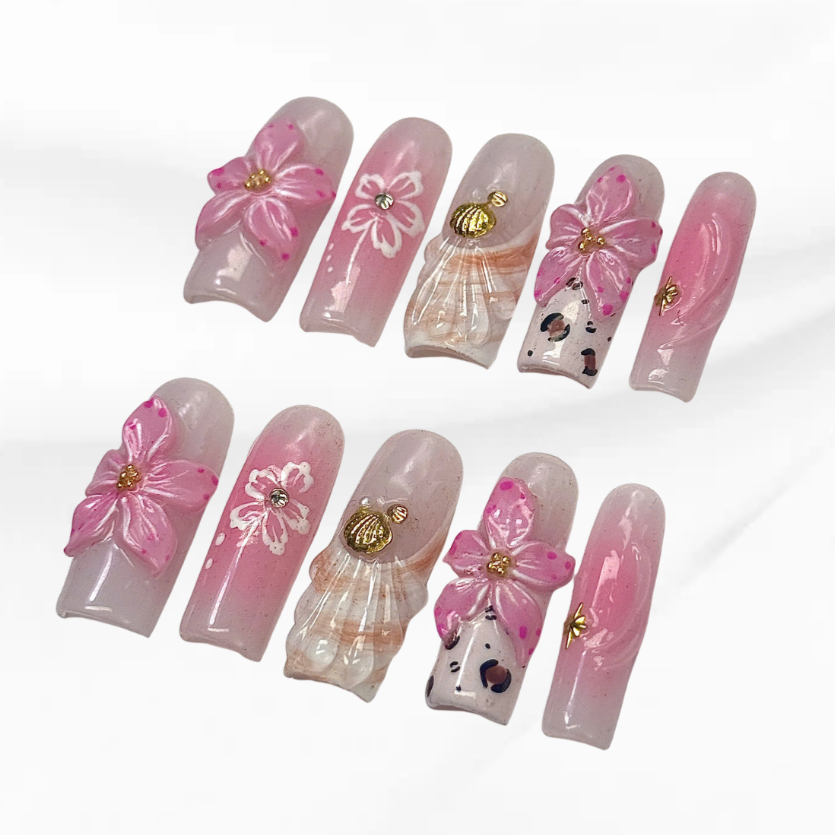 Long-lasting gel nails featuring pink tones and animal print design Leopard Shell Bloom 2